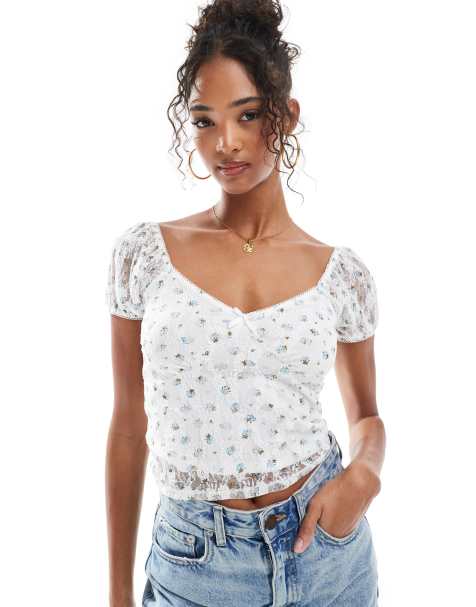 New Look - Top bianco con scollo a V e stampa a fiori - view 1