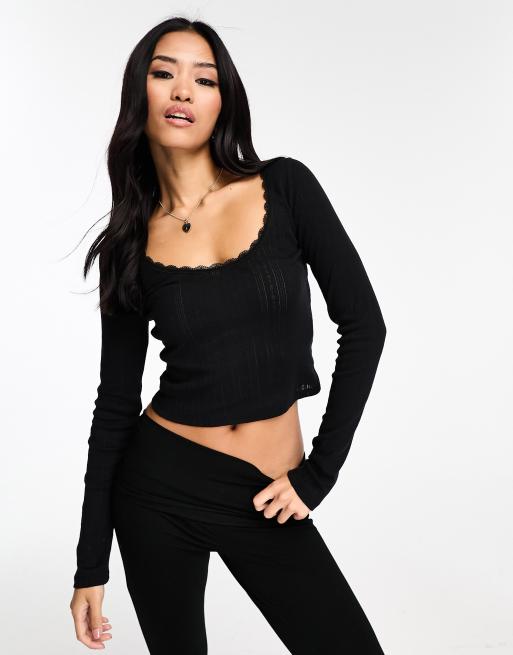 New Look - Top manches longues à encolure dégagée et bords en dentelle - Noir