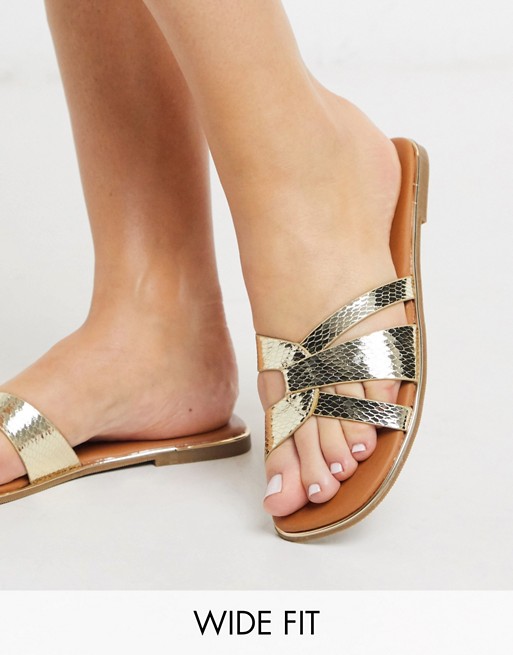 New Look Wide Fit leather look twist strap mules in gold