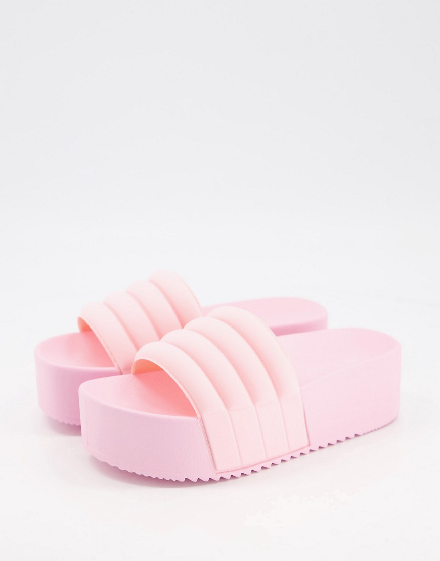 фото Нежно-розовые шлепанцы на плоской платформе asos design flori-розовый цвет