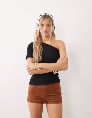NIA Gower faux suede shorts in tan