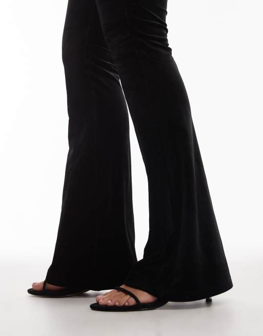 NIA Lumi slim flared velvet trouser in black, 5 of 5