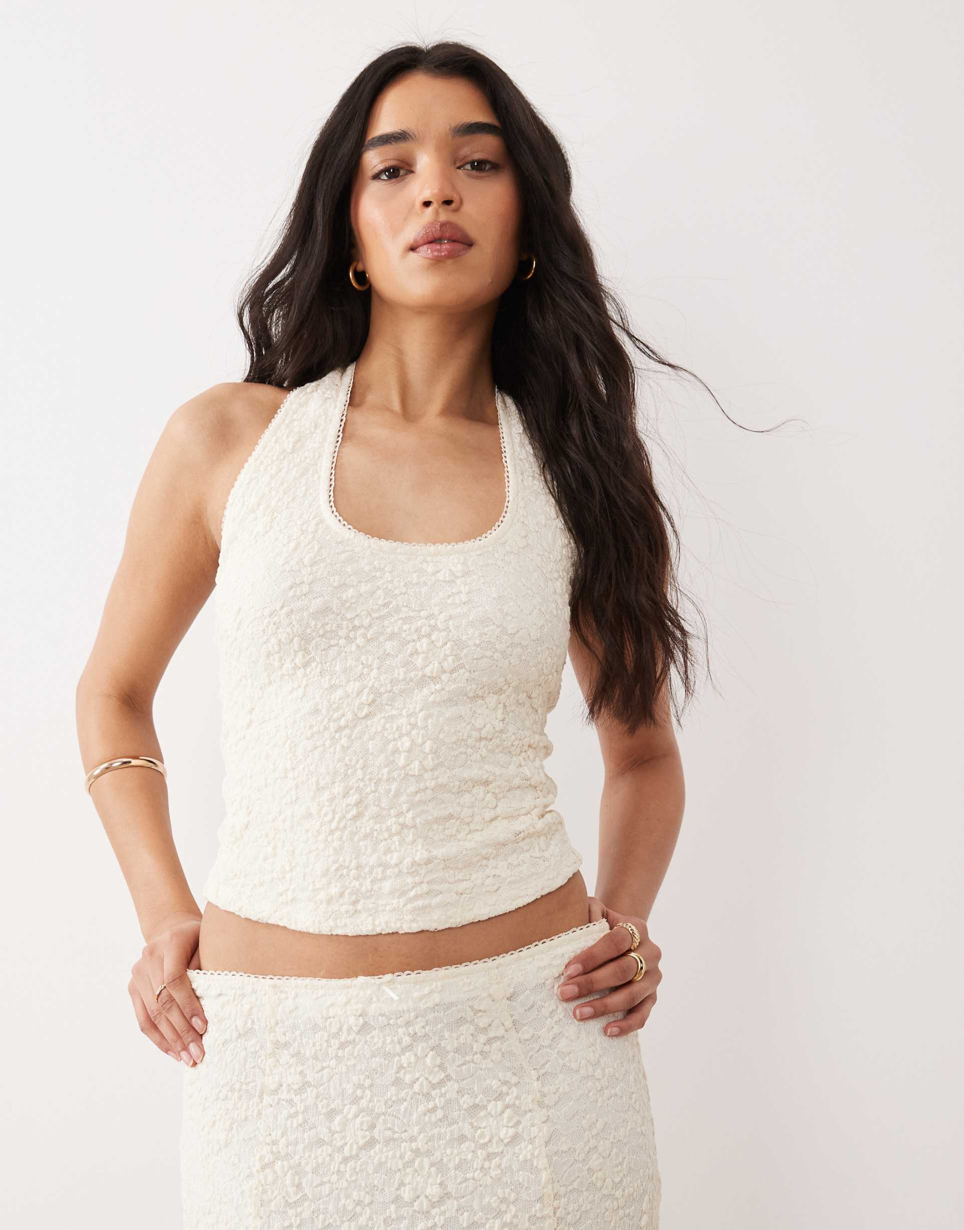 nia olive halter neck lace top in ivory
