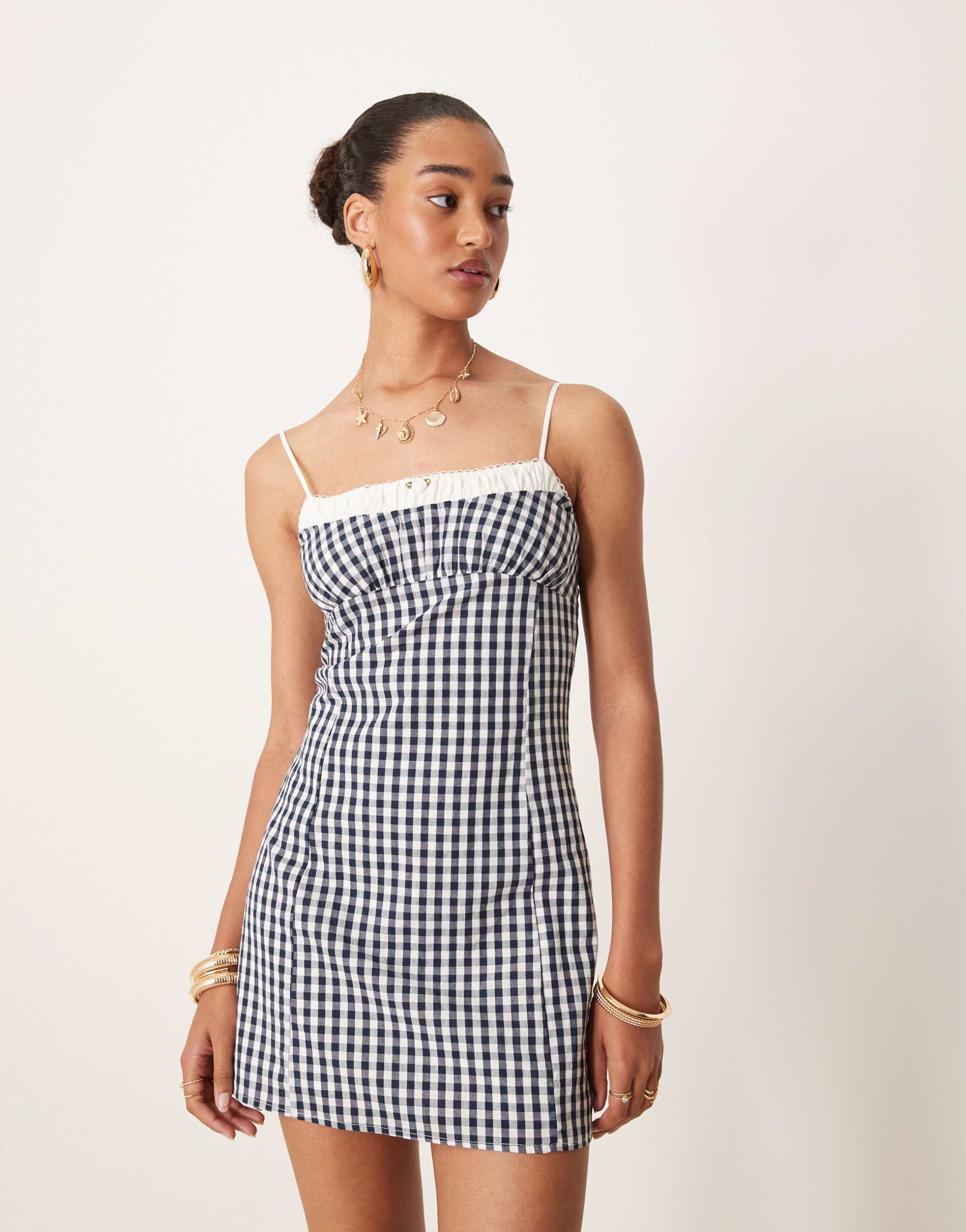 nia serrano gingham mini cami dress in black
