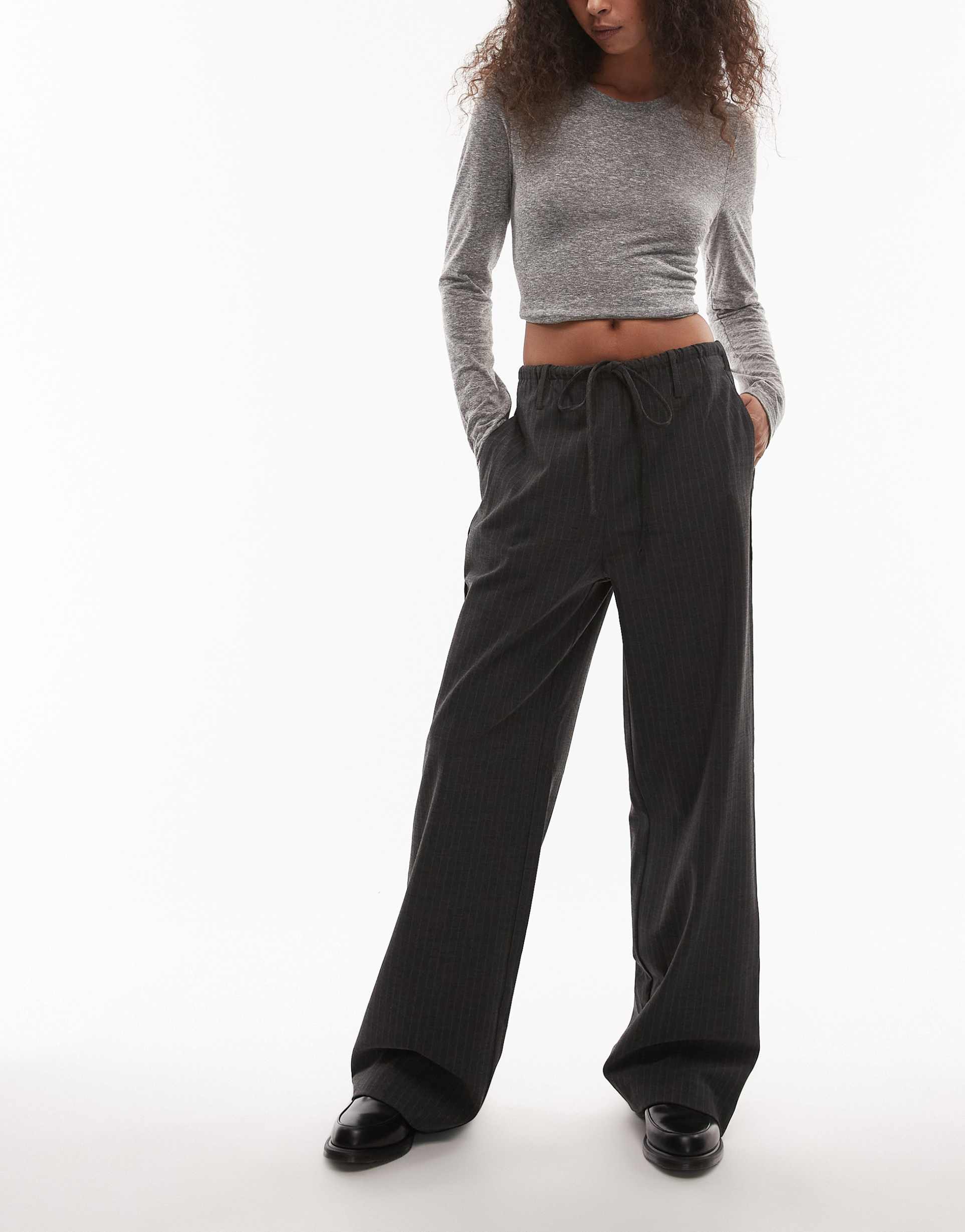 nia thalia pinstriped relaxed pants in charcoal