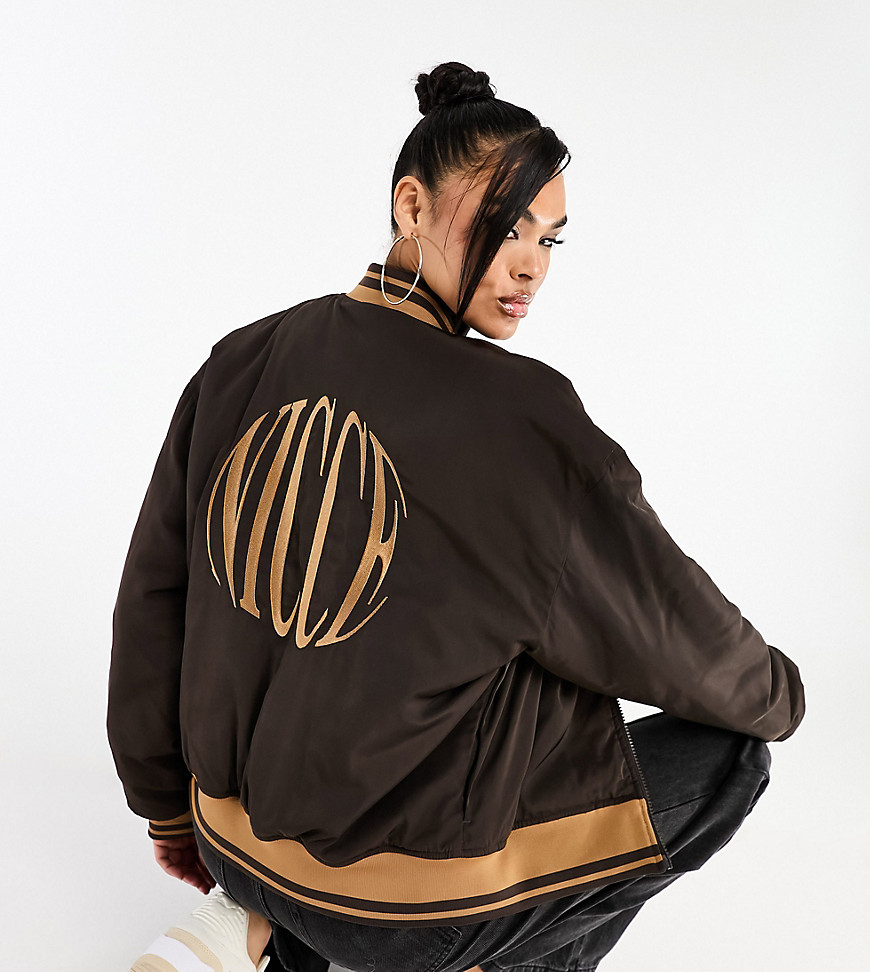 Nicce able bomber jacket in dark brown with back embroidered logo