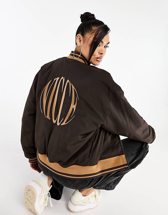 Nicce - able bomber jacket in dark brown with back embroidered logo