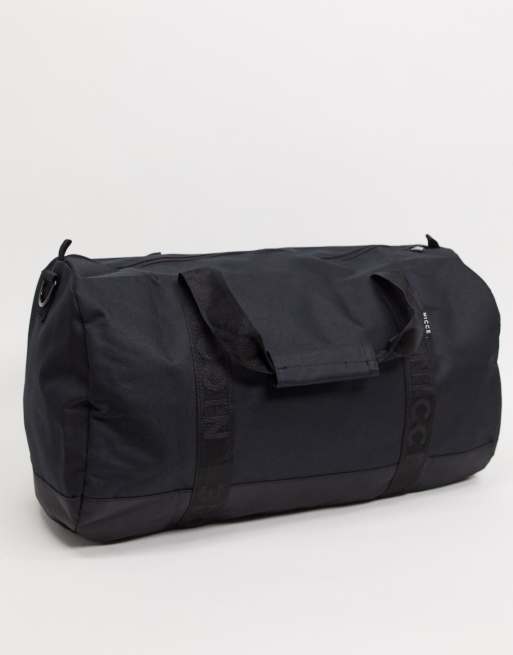 Nicce Andi barrel bag with small logo in black