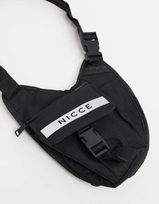 Nicce cross body bag with reflective logo print in black ASOS