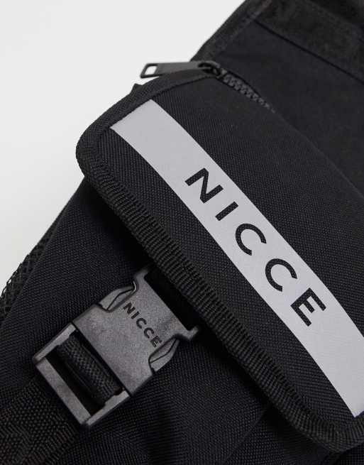 Nicce cross body bag with reflective logo print in black ASOS