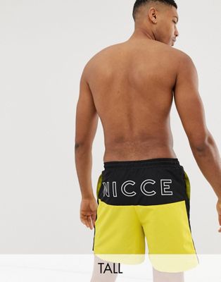 Nicce – gula badshorts med logga baktill