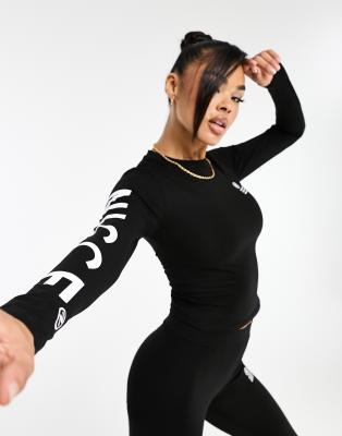 Nicce Nicce mara co-ord long sleeve top in black with sleeve print
