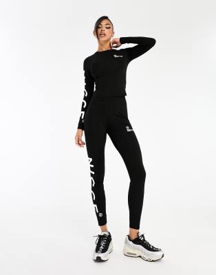 Nicce - Mara - Leggings in Schwarz mit platziertem Print, Kombiteil