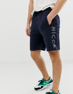 Nicce – Marinblå shorts med stor logga