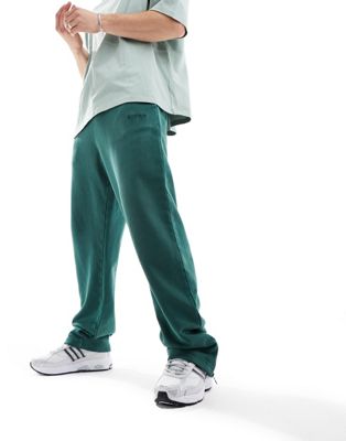 Nicce mercury straight leg joggers in forest green with vintage wash