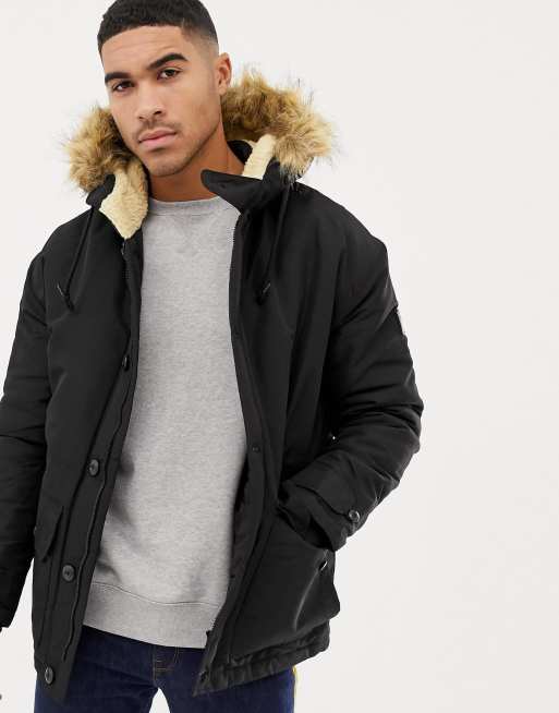 Nicce parka jacket in cheap black with fur hood