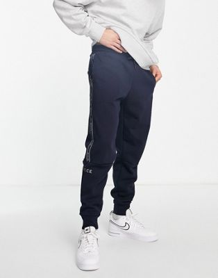 Nicce pulse taping joggers in navy