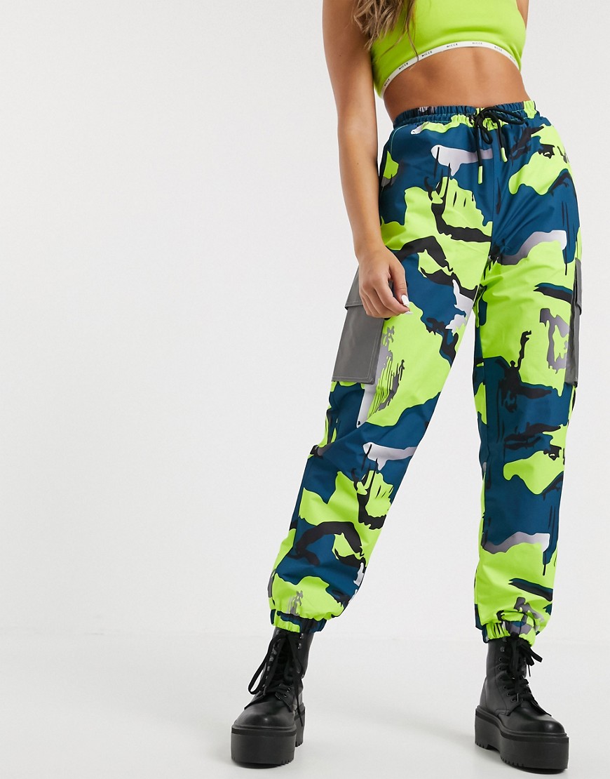 Nicce relaxed cargo pants with reflective pockets in bright camo co-ord-Multi