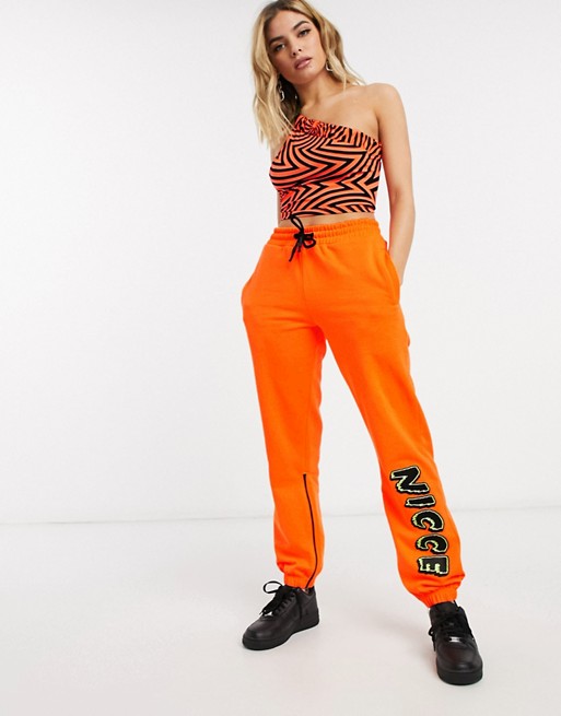 Nicce relaxed tracksuit bottoms with contrast logo