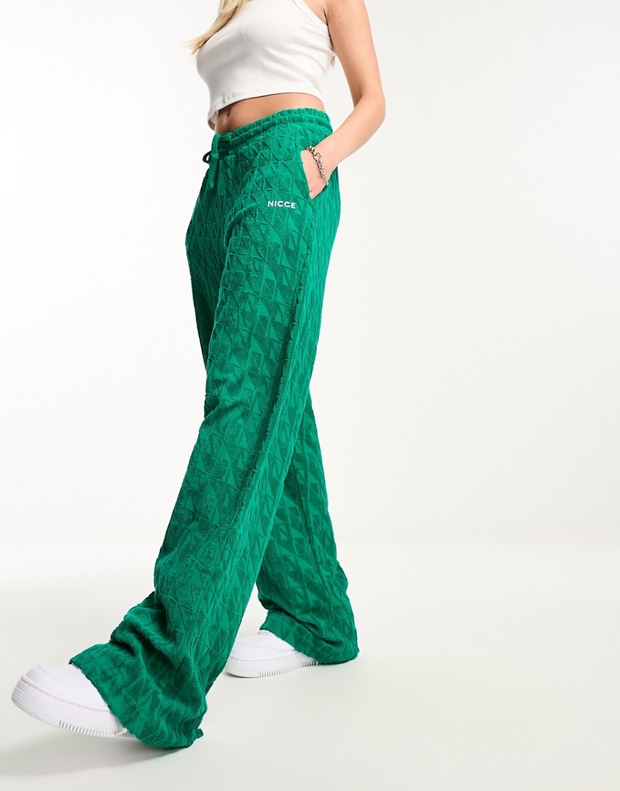 Nicce rue towelling trousers in green