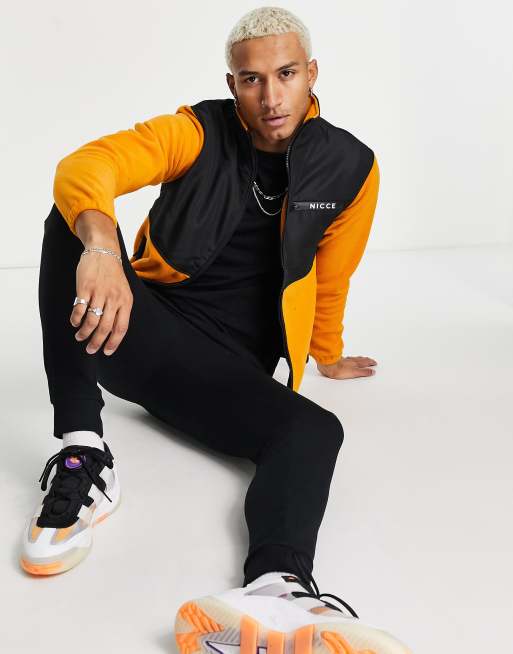 Black and orange sweatsuit hotsell