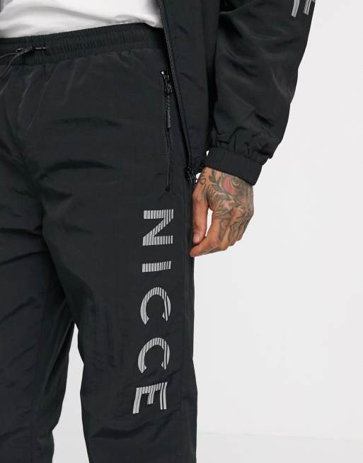 Nicce track pants in black ASOS