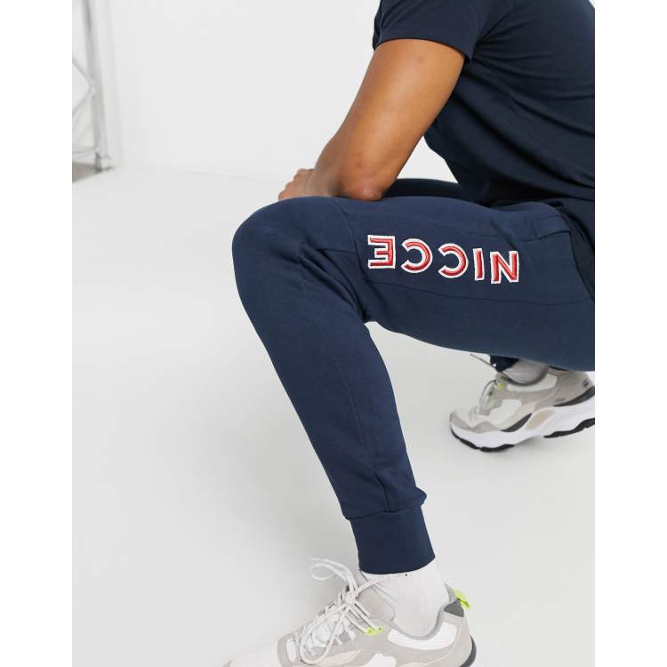 Nicce Truman joggers with embroidered side logo in navy ASOS