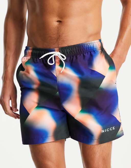 Nicee paradise print swim shorts in navy