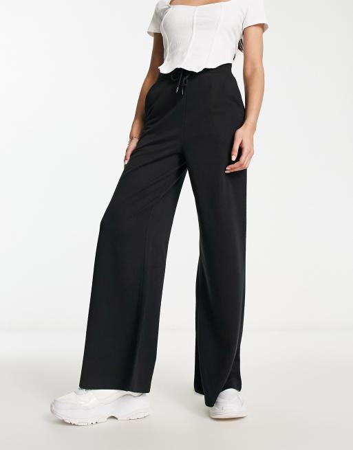Night Addict - Flared joggingbroek in zwart