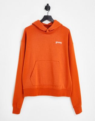 Night Addict groovy print hoodie in orange