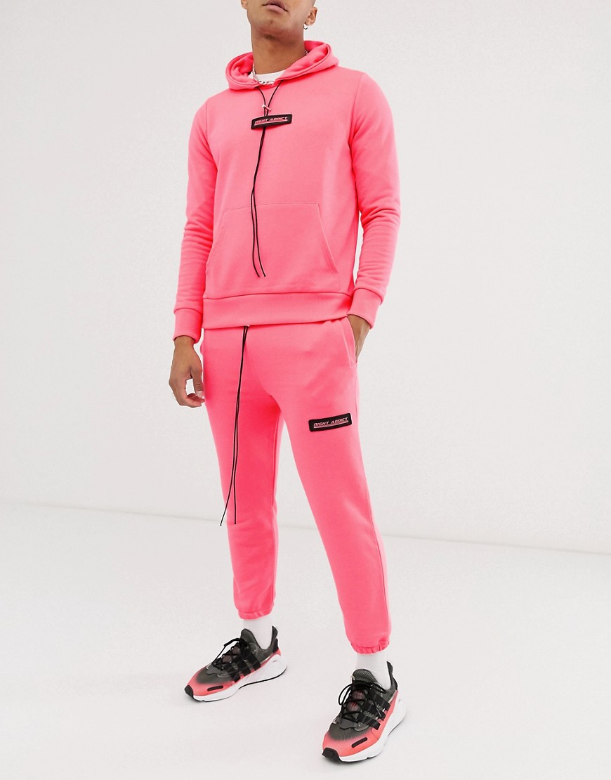 Night Addict neon pink slim fit joggers-Orange
