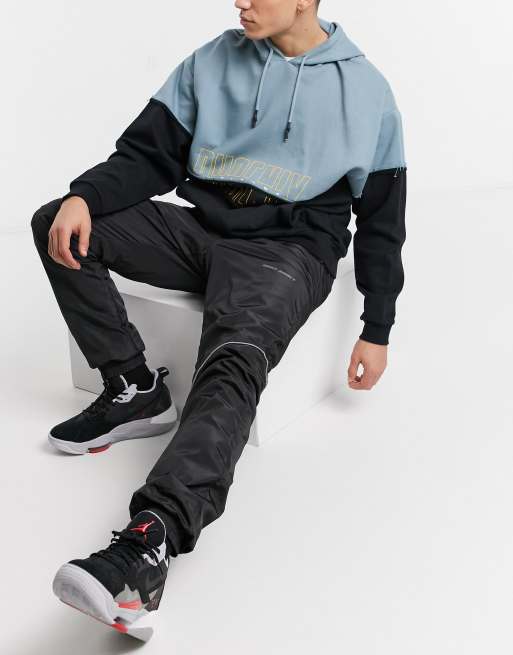 Black reflective best sale track pants