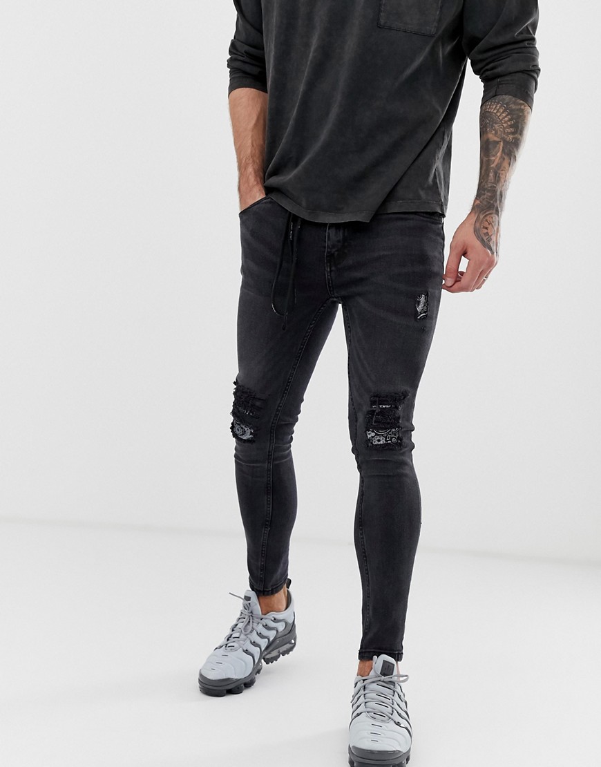 Night Addict - Skinny fit ripped jeans met taillekoord-Zwart