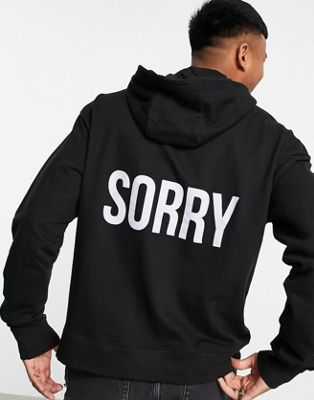 Night Addict sorry not sorry backprint hoodie in black