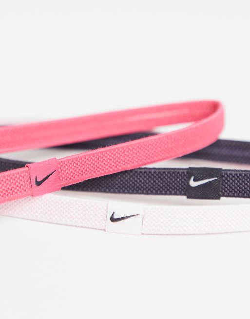 Unión Distinción medida Nike 3 pack elastic logo headbands in pink | ASOS