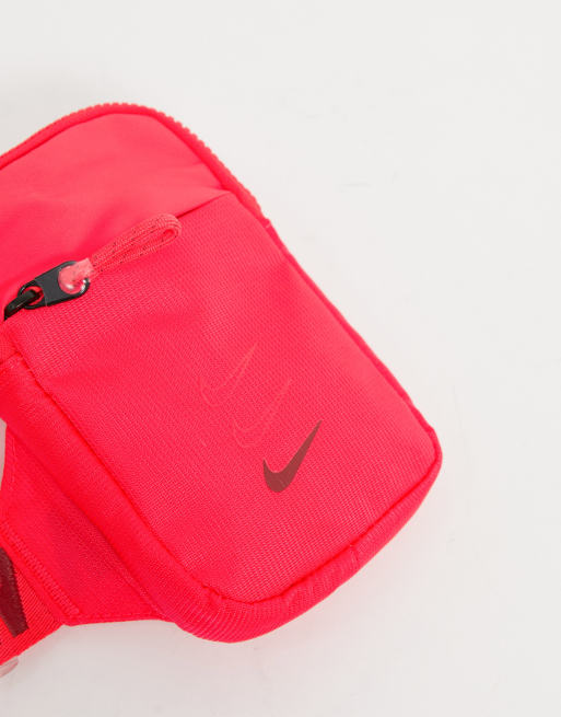 Nike Advance logo taping crossbody bag in red | ASOS
