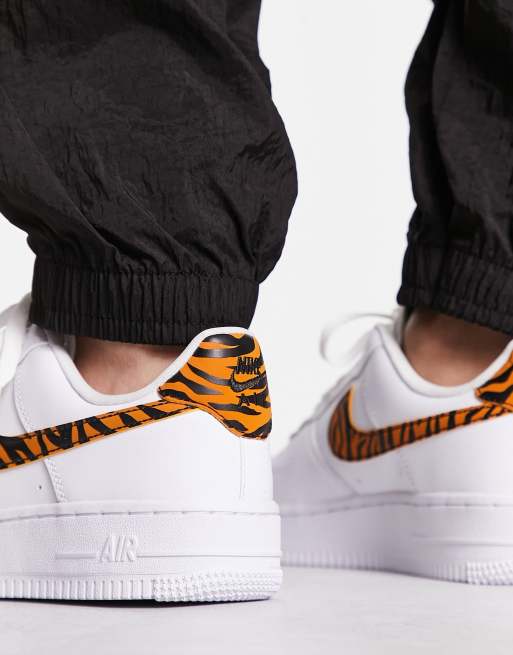 Nike AF1 07 trainers in white and zebra print