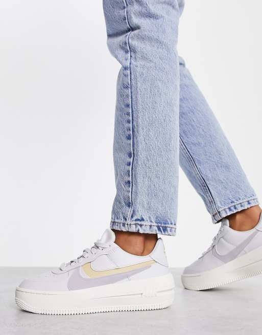 Nike grey on sale and gold trainers