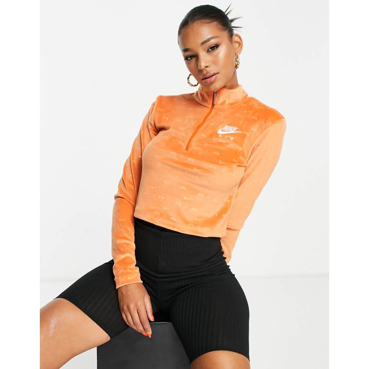 Nike Air all over logo quarter-zip velour long sleeve top in spice