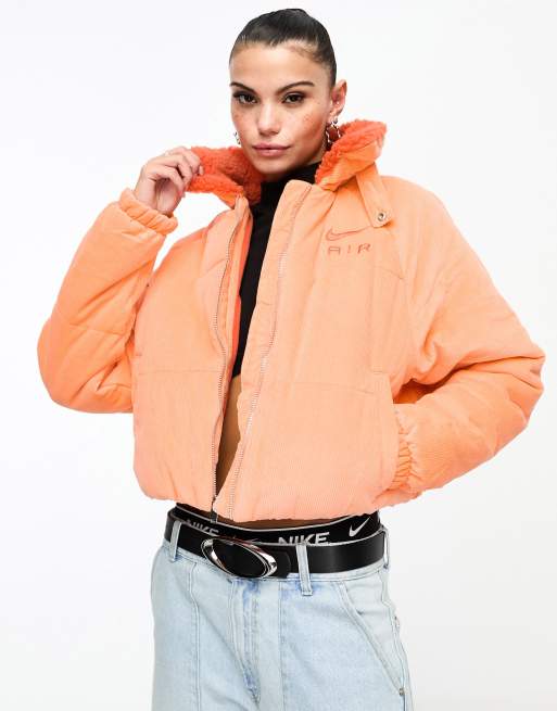 Nike Air cord padded jacket in orange trance | ASOS