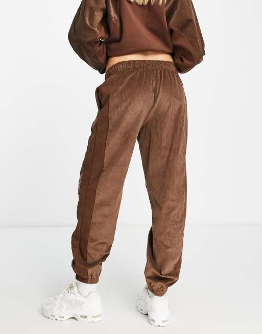 Nike Air corduroy fleece joggers in brown