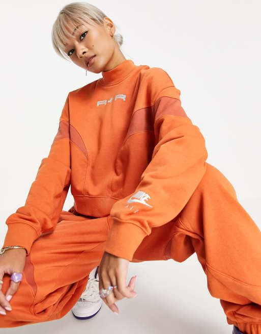 Nike Air fleece tracksuit in orange ASOS