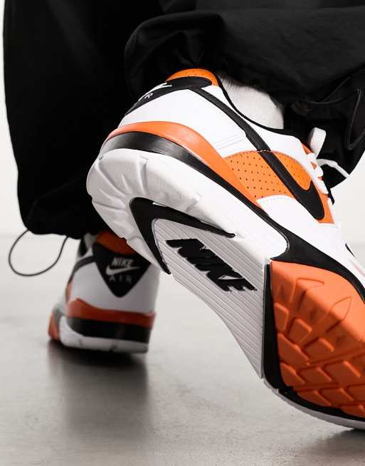 Nike Air Cross Low Sneakers in White & Orange