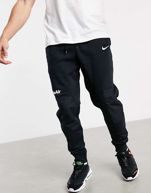 Nike Air cuffed joggers in black | ASOS