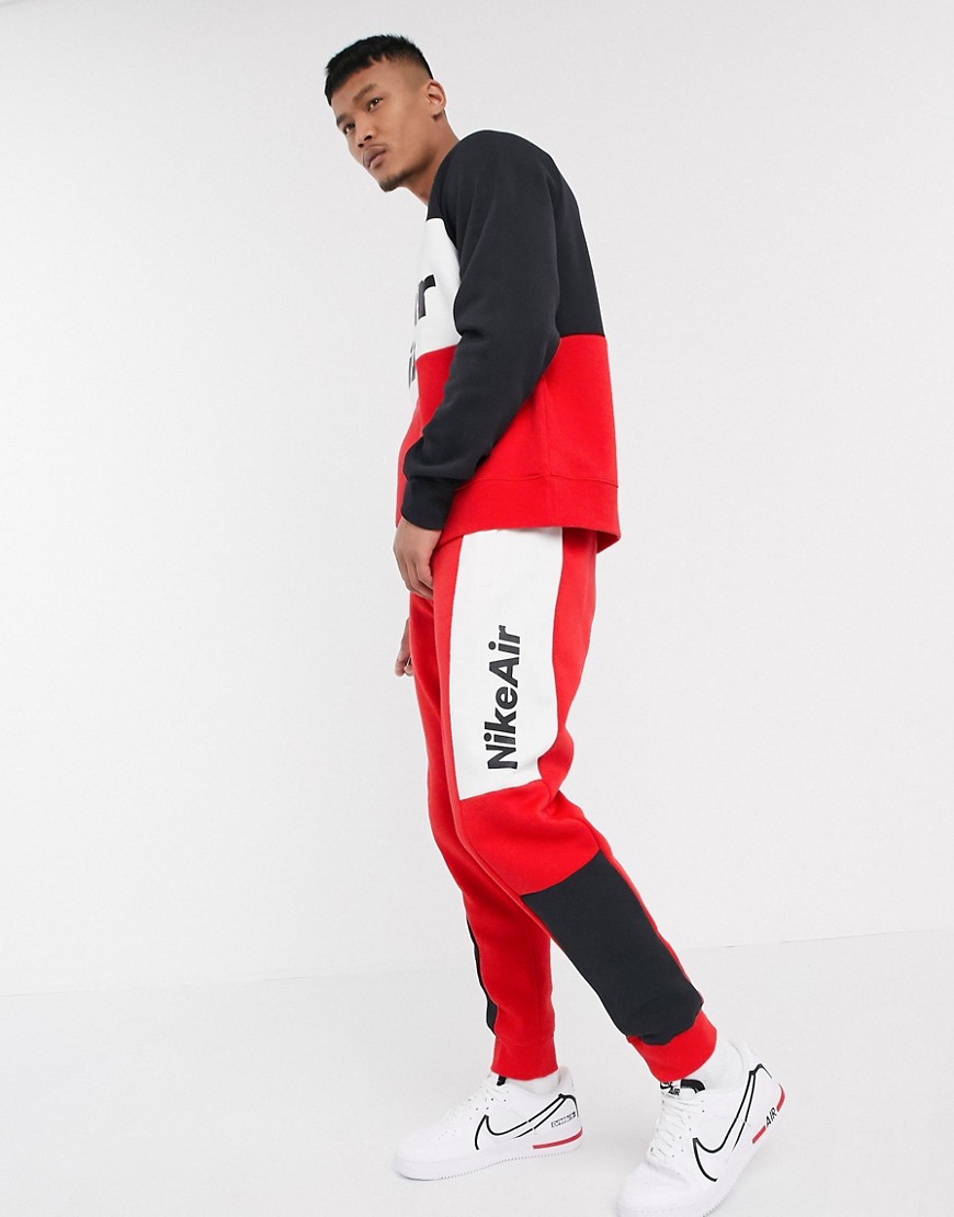 Nike Air cuffed joggers in red