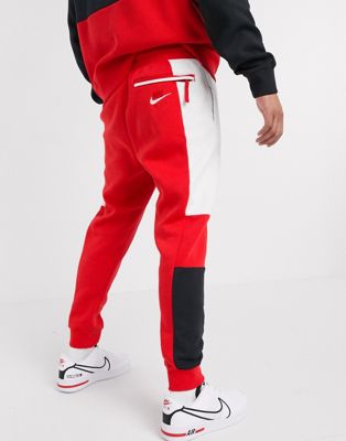Nike Air cuffed joggers in red | ASOS