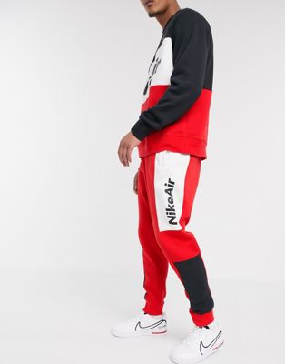 Nike Air cuffed joggers in red | ASOS