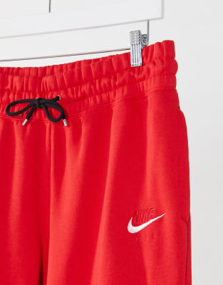 nike air cuffed joggers in red