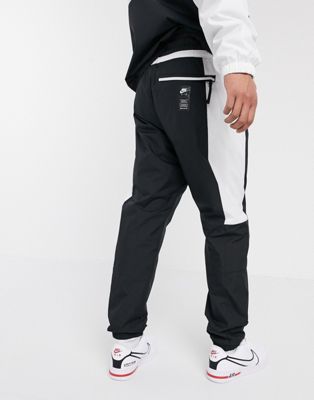Nike Air cuffed woven joggers in black 