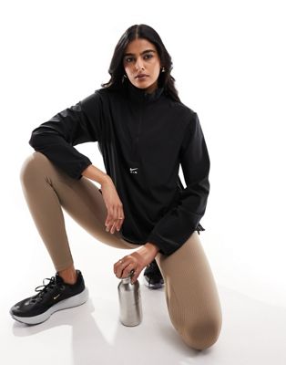 Nike Air Dri-FIT half zip woven jacket in in black - ASOS Price Checker